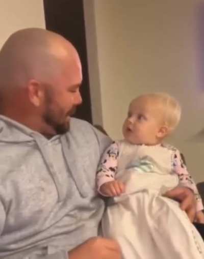 Baby trying to process dad&rsquo;s new haircut