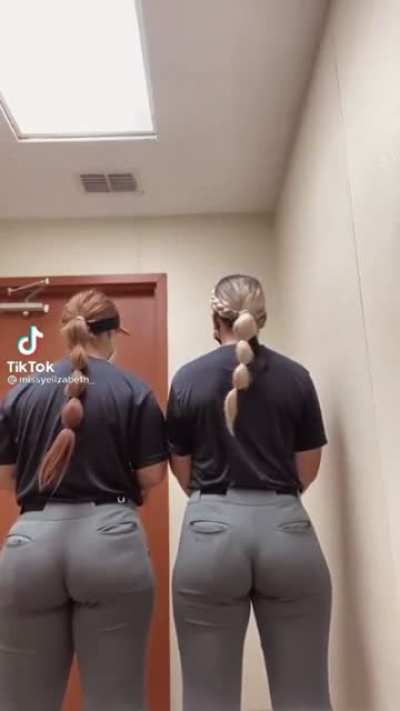 Two softball pawgs