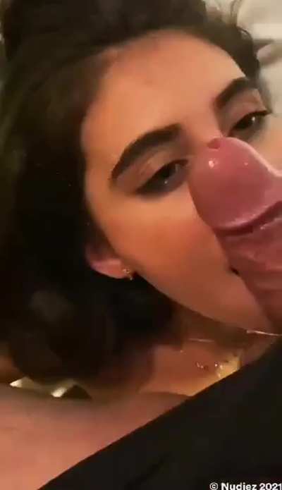Covering her face