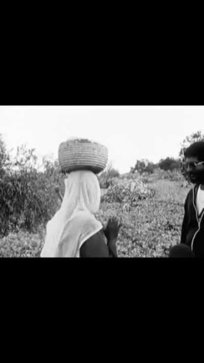 old video (around 1940), Palestinian old lady talking with the settlers refusing to leave her land