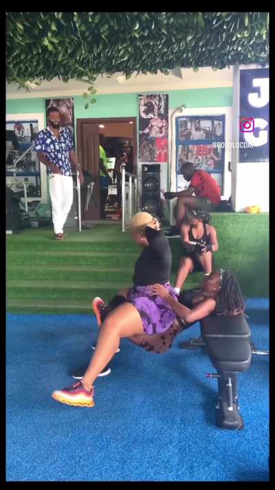 Lesbian fitness model humping her big booty workout partner in the gym