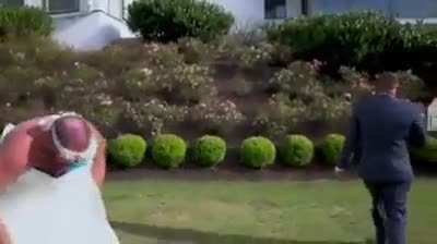 Groom sees his best friend in wedding dress.