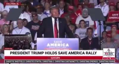 A crowd in mid-cheer immediately goes silent and starts jeering Trump when he says that he recommends people take the vaccine.