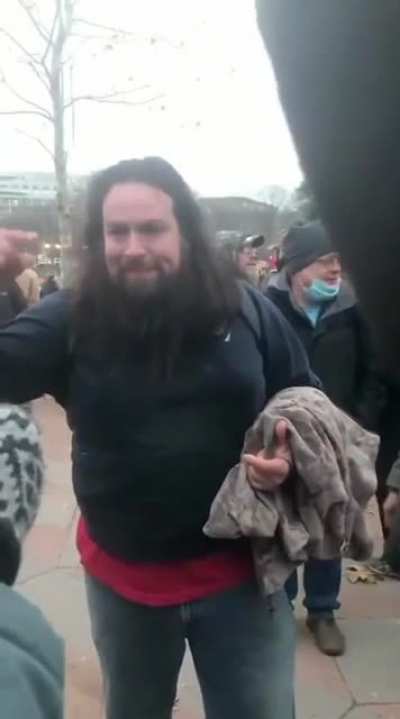 This MAGA death cult member was seen beating a cop during the terror attack on the Capitol. If you know who he is, please contact the FBI.