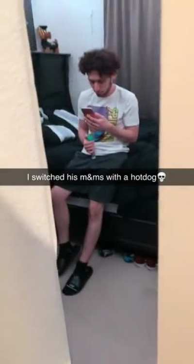 Guy switches his friends m&amp;amp;ms out for a hotdog