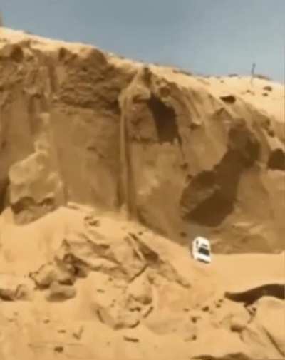 A jeep going down a steep hill