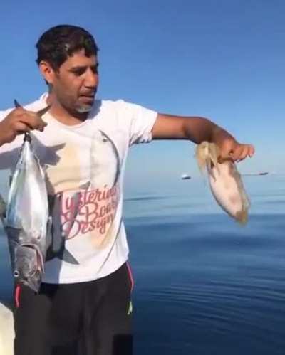 WCGW holding a... Squid?