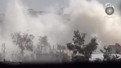 Opposition engineers detonate a tunnel bomb underneath a pair of fortified SAA apartment buildings along al-Mutahlaq Road - Jobar, Damascus - 2/9/2014