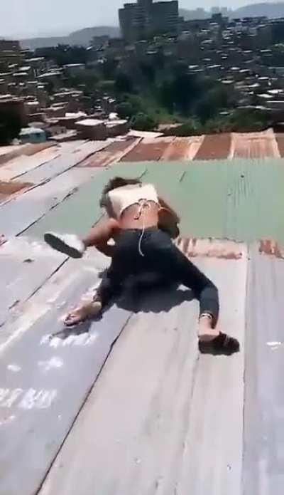 Two venezuelan women get into a fight, then break a roof and both fall through it