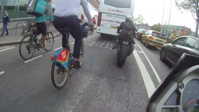 Cyclist faceplanting after accelerating into a curb and some crazy traffic in Dublin