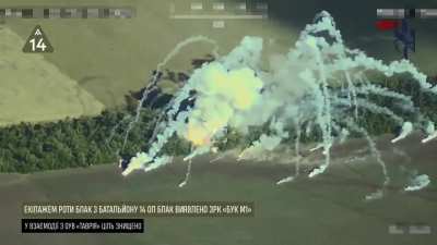 Drone footage of another Russian 9K37 "Buk" air defense system getting destroyed by a missile fired from a Ukrainian M142 HIMARS.  