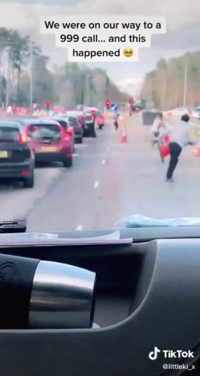 Public making a way for the ambulance