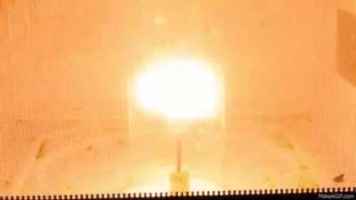Creating plasma in a microwave oven.