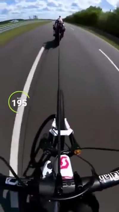 How fast can you pull a bike behind a motorbike.
