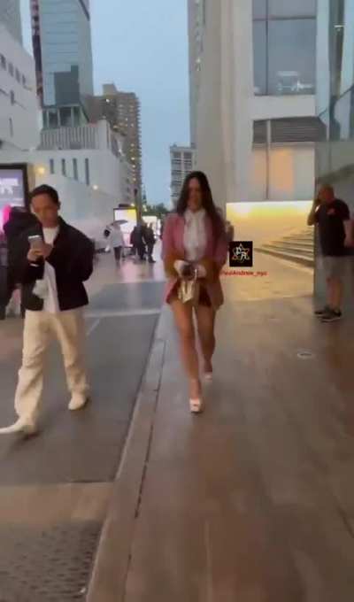 Rae walking the streets of NYC