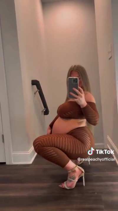 OF model works through her pregnancy.