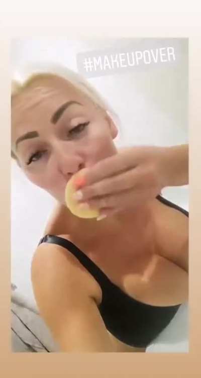 Marika Fingerroos removing make up with just bra on
