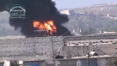 Opposition "Hell Cannon" strike manages to hit an SAA controlled fuel tank of some kind - Ramouseh, Aleppo - 4/12/2014