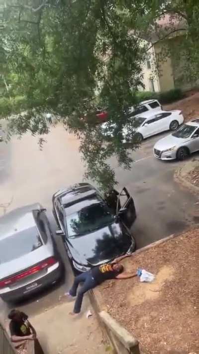 female cop almost getting ran over by her own car