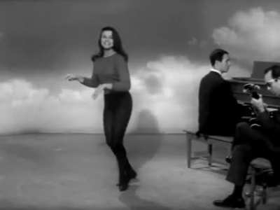 Ann-Margret showing off her singing &amp;amp; dancing skills as part of personality test, 1961
