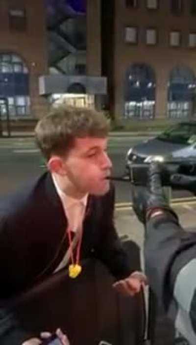 Guy blows into a radio thinking it’s a breathalyzer.
