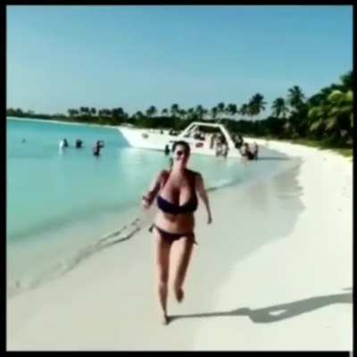 Big woman running with massive implants