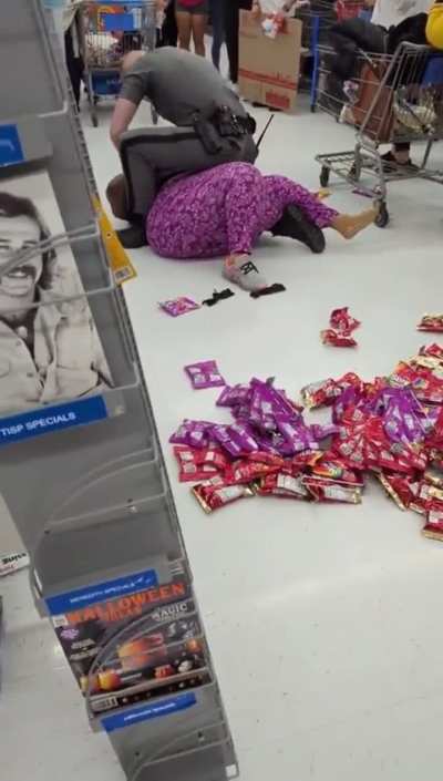 Woman caught shoplifting at Walmart freaks out