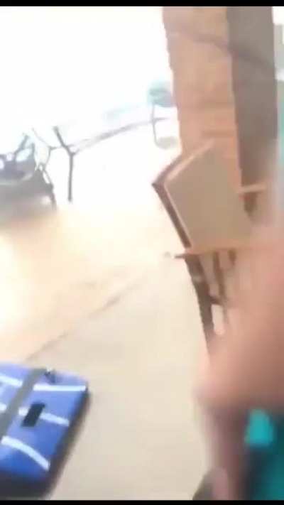 On second thought he decides to stay inside.