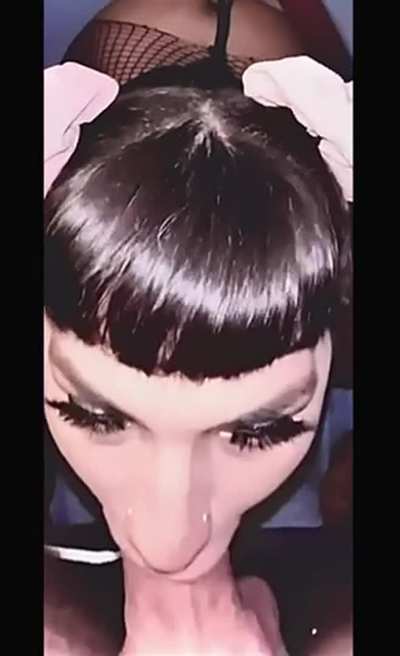 Filling a pigtailed goth&rsquo;s throat with a thick cock