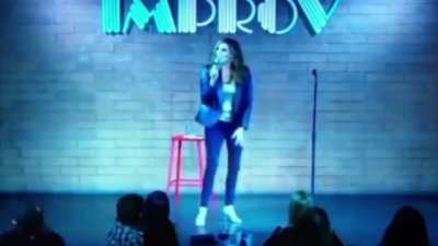 Timing of comedian fainting after making jokes about about being vaxxed, boosted how much Jesus loves her is so perfect, audience thinks it's part of the act