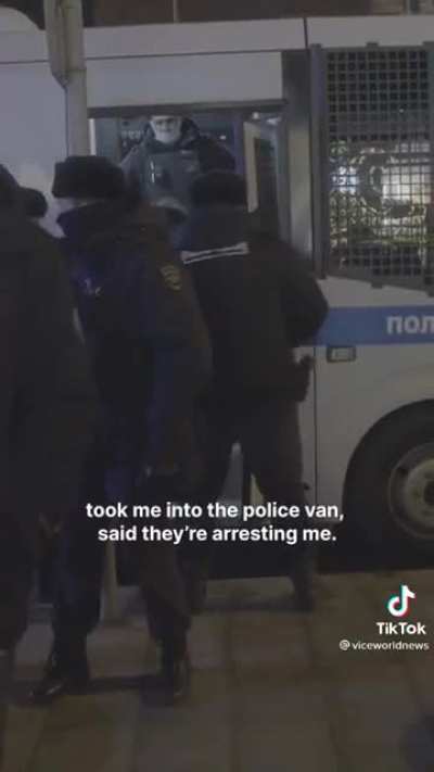 "American journalist!" shouts Alec Luhn of VICE News as he is arrested in Moscow while covering protests against the war in Ukraine.