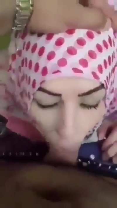 Hijabi Muslim woman on her knees doing her favourite job " Sucking Dick" That's their favourite thing to do