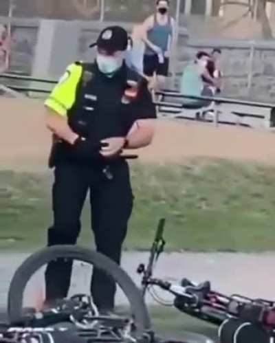 Police punches and chokes a man while being pinned by 5 cops.