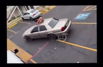 Full Video of woman getting her hand shut in the car door.
