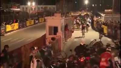 Rider stands in the middle of cycling race