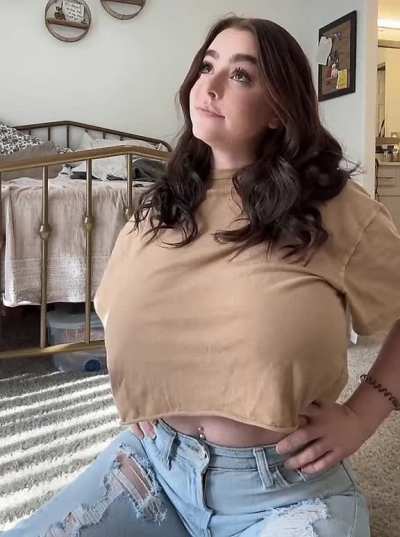 In brown shirt
