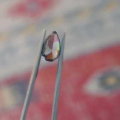 1.31ct, 9x5.2mm Grey/Blue/Purple Spinel. Recut from commercial piece, small visible inclusions and a dusting under magnification. It's steeley grey and goes deep blue and in some light deep purple! $500 +sh