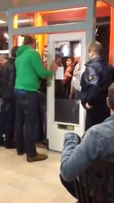 Woman gets punched through glass