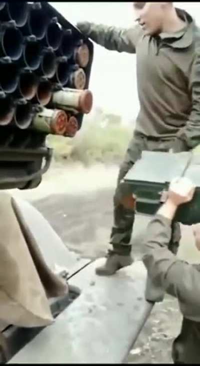 Russian military are recharging the BM-21 "Grad" MLRS