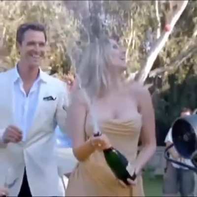 Scarlett Johansson pops champagne