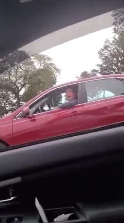 Racist white man slows down and yells the N-word at Mexican father taking his 12-year old daughter to school in Chicago.