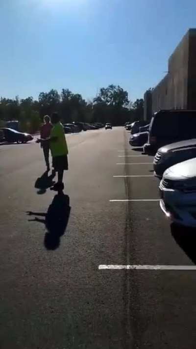 A woman calls her boyfriend over to beat up her coworker, only for the boyfriend to eat some fists and a couple of German supplexes