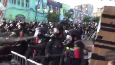 The moment Seattle police instigate a riot over a pink umbrella (seriously). Protest was 100% peaceful before. Share this! Police are already lying about what happened.