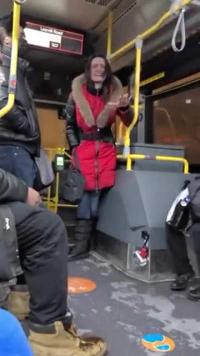 Crazy woman argues about COVID-19 on transit bus