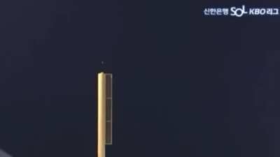Gang-nam Yu Of The Korean Baseball Organization&rsquo;s LG Twins Hits A Home Run That bounces off the top of the foul pole
