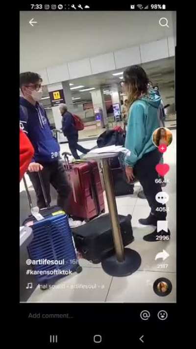 airport karen treats her boyfriend like shit in front of everyone at the airport.Poor guy