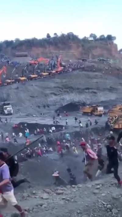 Myanmar is the world's largest source for jade. Although the country produces roughly $30bn annually, there's no end to national poverty. "Scavengers" seen here, try to make a living off the industry's leftover pilings.