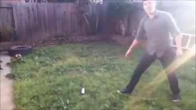 Throwing a knife into a spray can.