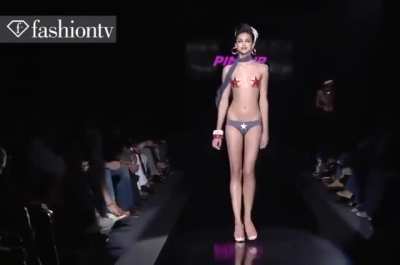 Topless on runway