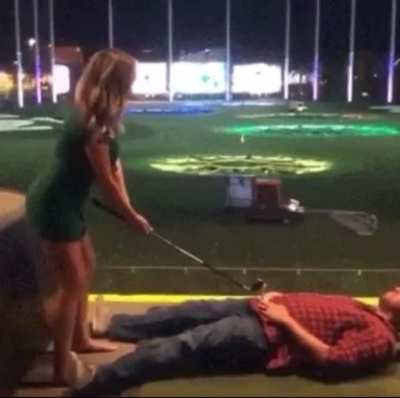 Letting someone swing a golf club 2 inches from your nuts
